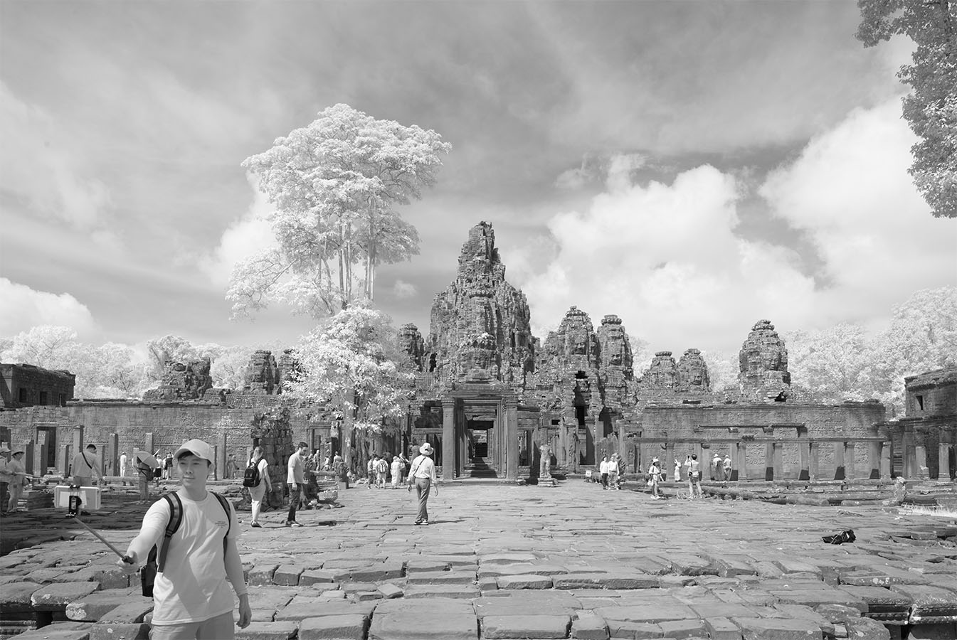 Entrance to Angkor's Bayon Temple, with Selfie Wielding Tourist.